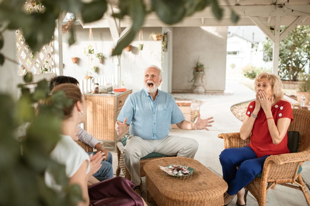 Older man talking in a caregiver support group circle