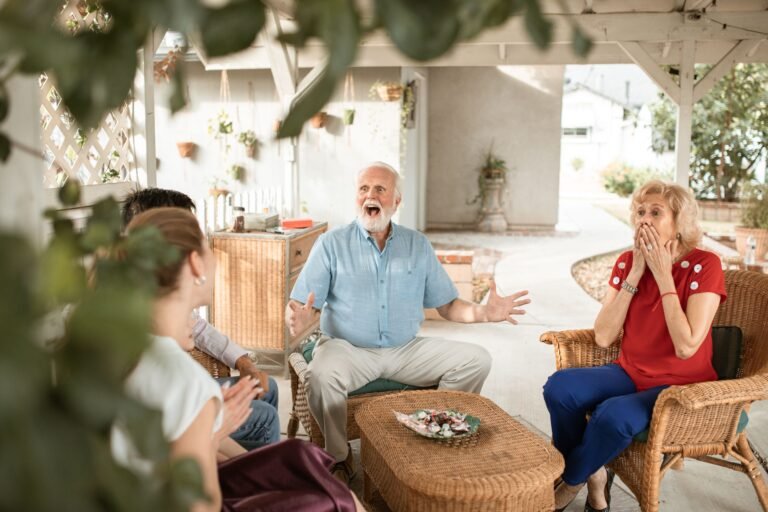 Older man talking in a caregiver support group circle