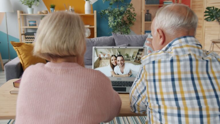 Older couple on a video call with their family