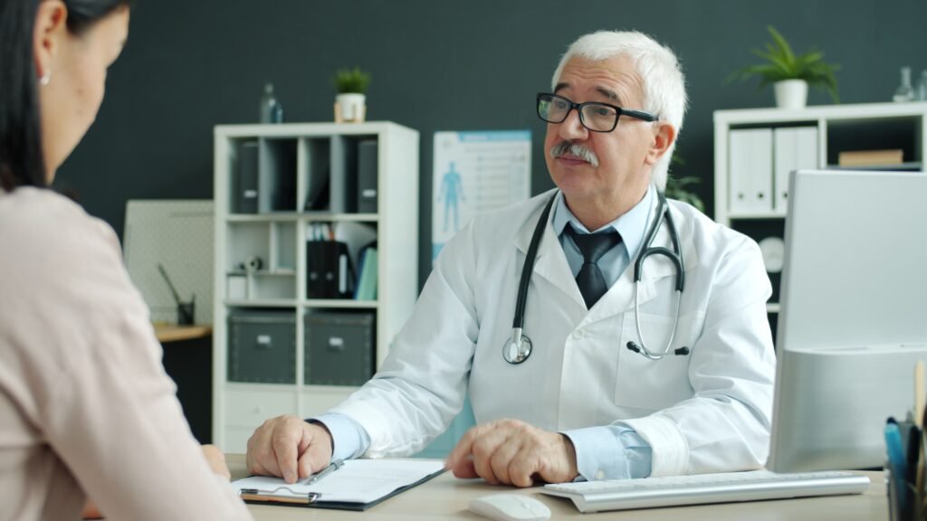Doctor at his desk ready for a patient appointment