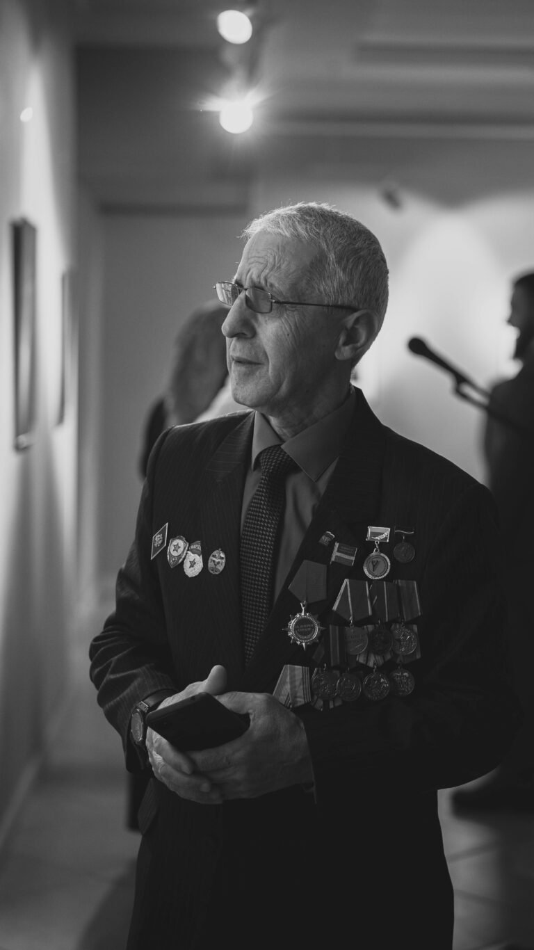 Older veteran wearing his service medals